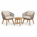 Ensemble bistrot en bois avec chaises en corde et coussins en tissu